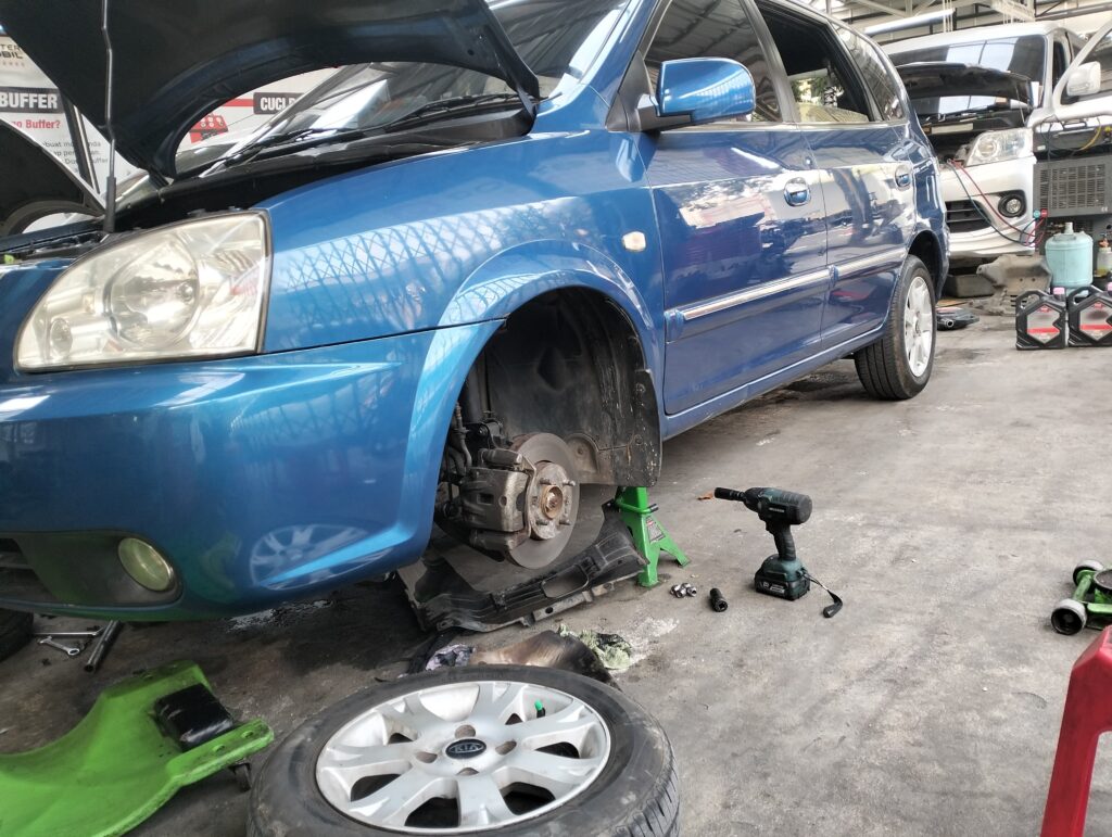 Bengkel Kaki Kaki Mobil Kia Carens